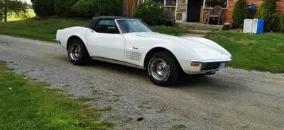 1971 Corvette Convertible. White with red interior. New paint and carpet. 4 Speed. Chrome bumpers. N...