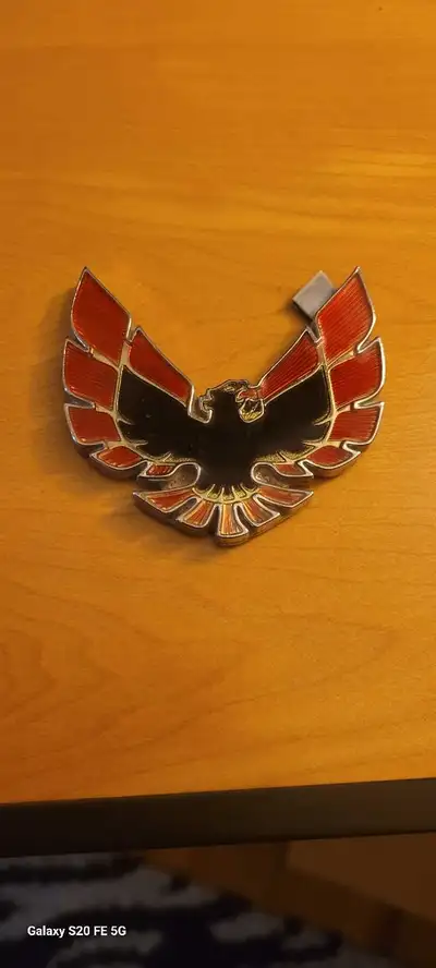 This vintage Firebird emblem is in good condition, perfect for restoring a classic car. As you can s...