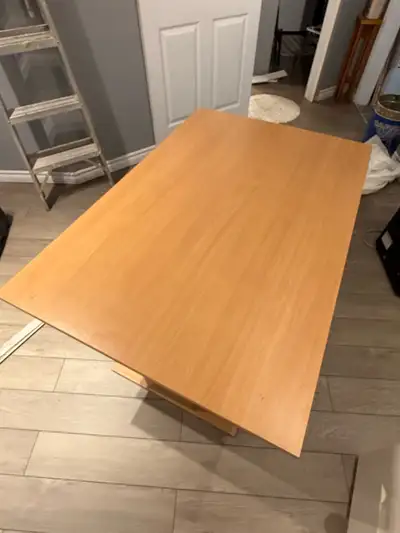 Dinning or craft room table with attached leaf., View more