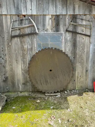 Antque saw blades and axes , View more