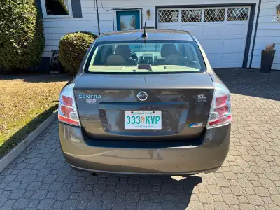 Like new Sentra 2litre,heated front seats and mirrors.Power windows,door locks,mirrors,trunk and fue...