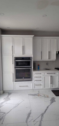 Refinish and refacing kitchen cabinets with high quality spray p