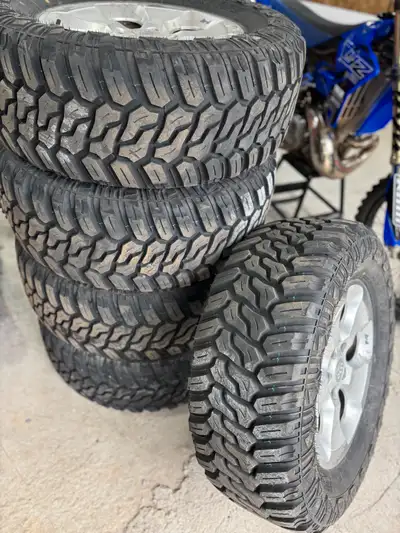Tires are Brand New - made two trips across the island with them, less than 3000 km on them. 5 - LT...