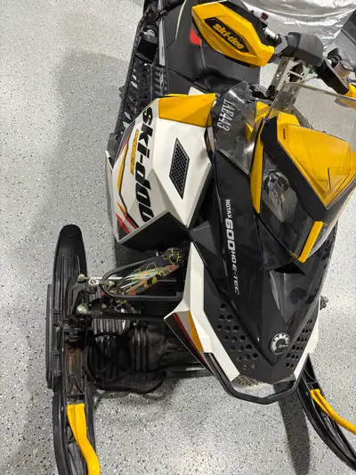 I'm selling a mint 2012 Ski-Doo MXZ X 600HO E-TEC, a high-performance snowmobile. This machine is po...