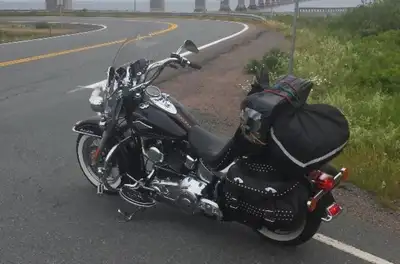 Heritage Softail Classic has over $5,500 in customizing and options including: Screamin' Eagle Exhau...