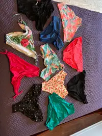Various bikini tops and bottoms
