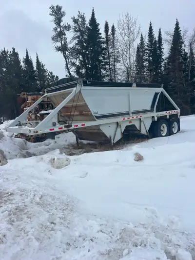 Great Condition 2001 Castleton Cross-Dump Trailer. Safetied and parked.