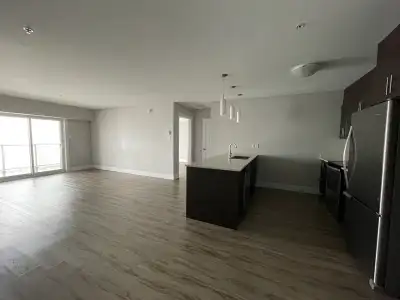 Spacious top floor unit featuring two bedrooms, including a primary bedroom with a large walk-in clo...
