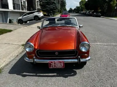 This is a 1972 MG Midget, only 72 to 74 had round rear wheel arches. The car has new leaf springs, n...