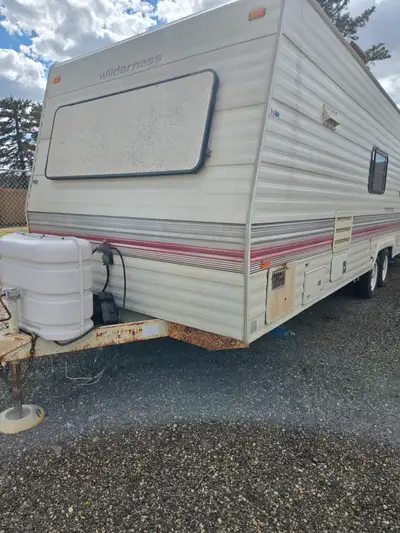 26ft bumper pull travel trailer. Half tonne towable. As far as i know everything works has a/c. $600...