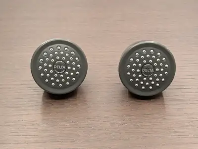 Never before used Delta shower head. Replaced it with one that had a hose the first day I moved into...