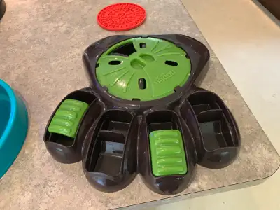 Get your paws on this fantastic bundle of dog feeding fun! This set includes a Outward Hound slow fe...