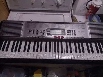 Great little unit. Keys light up during learning mode. Good beginner and then some. Teacher had the...