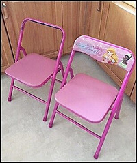 Two toddler fold up chairs (one missing back rest)