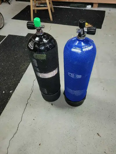 2 - 80 cubic foot dive tanks, both certified. Full. 250.00 each
