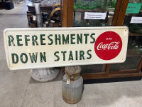 Metal Coca Cola refreshments down stairs sign 