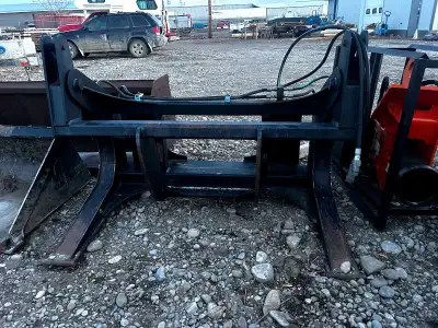 Used like new heavy duty Skid Steer Grapple Great for moving logs, pipe etc. Custom made in Creston...