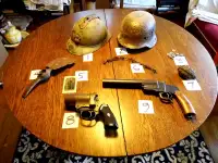 WW1 and WW2 -  flare gun,  helmets,  canteen