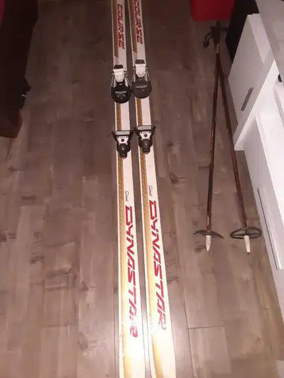 These are Dynastar Course skis, ready to hit the slopes! They've seen a few winters, so they're not...