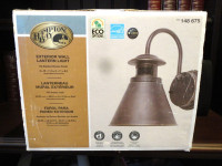 Selling a New Hampton Bay Motion Exterior Wall Lantern Light