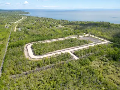 Large Lots, just 700 yards from Lake Winnipeg. Still some treed Lots to choose from, and 2 large pie...