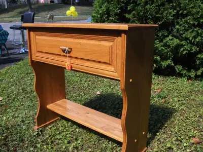 Golden Stain color. has a Pull-down Door that reveals 1 Shelf and has 1 open Lower Self. 30 inches l...