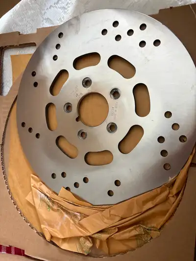 This is a Harley Davidson Front Disc Brake Rotor, part number 44136 it is brand new and sells for $3...