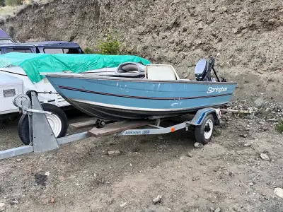 This boat is ready to go in the water. Comes with Highliner trailer, all lights in working order. Re...