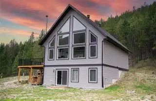 4165 Highway 93 - Gorgeous A Frame home set on 20 acres!