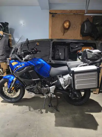 Tall and standard windscreens, Yamaha low seat and original seat, skid plate, bar risers, new Heiden...