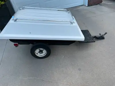 2005 Trail Master Trail Mate cargo trailer. Light weight and pulls easily behind a motorcycle or sma...