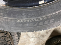 Set of 4 winter tires with rims  Michellen 235 60 18"