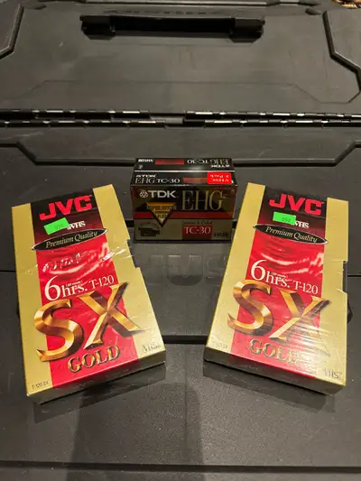 Brand new and sealed Capture memories with this lot of VHS tapes, including JVC T-120 SX Gold 6-hour...