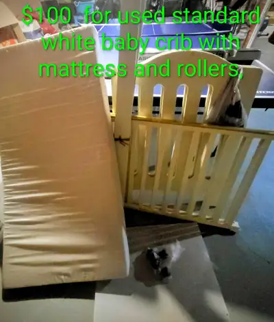 Used white ELFE baby crib with rollers and mattress, View more