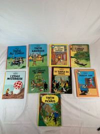 Lot de 9 livres de Tintin donc 2 album double 