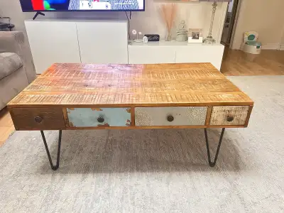 It has 4 drawers. Dimensions 117cm*66cm*47cm(h)