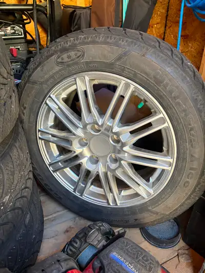 4 Good Year Winter tires and rims 235 60R18 with good tread. $500 Text 306-536-2947