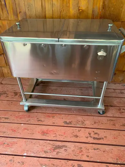 Both great for cottages. Both in good condition Cooler 21x35x14deep Poker table 4 feet Located in Wo...