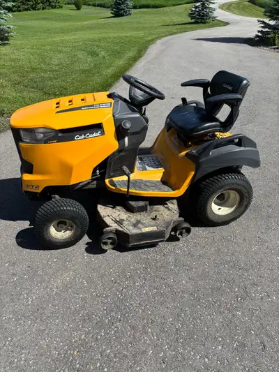 Cub Cadet purchased in 2020 with snow blower attachment and tire chains. Mower is a 46 inches deck....