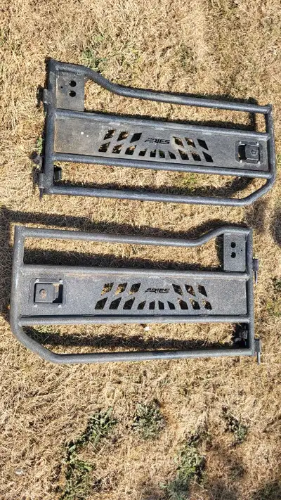 I'm selling a set of Aries Jeep Wrangler doors, providing rugged style and protection for your off-r...