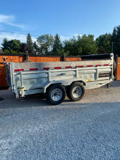 Titan 7x14 Galvanizes Dump Trailer. Selling cause we don’t use it. Been used 4 times. Like New. Spec...