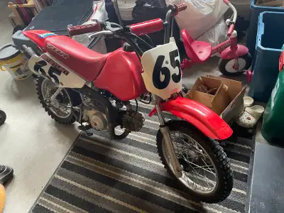 2000 Honda 70r, runs good. $1300 o.b.o