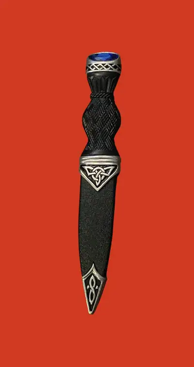 Selling a Scottish Cross Hatch Celtic Design Sgian Dubh with Amethyst Style Stone in Polished pewter...