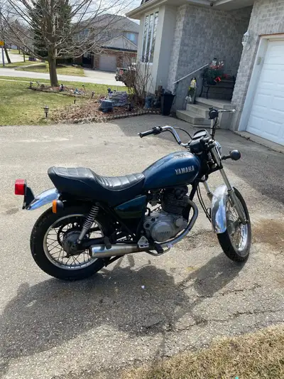 1981 sr250 Yamaha exciter. Needs some TLC. Battery, back tire, selling as. 70 mpg. Cheap insurance....