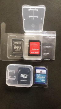 4 New Assorted SanDisk Adapter Cards and 2GB SD Card
