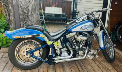Priced to sell!! Classic blue and silver custom Harley-Davidson Softail with a chrome-finished Evolu...