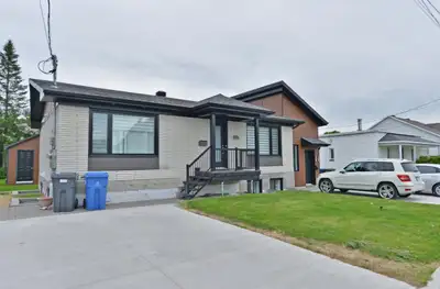 Superbe 5 1/2 style condo, situé dans un triplex