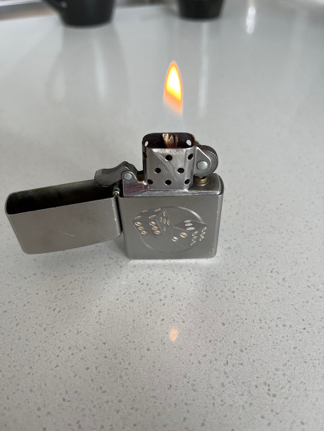 Roll the dice Zippo in Arts & Collectibles in Calgary