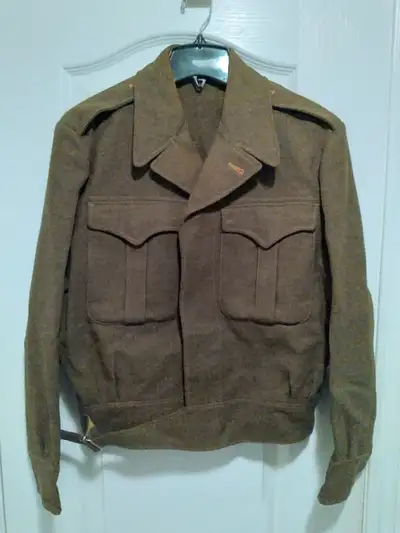 Royal Canadian Army issue battledress uniform is date stamped 1951 - Korean War era. It includes pan...