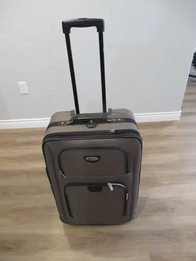 This suitcase was hardly used, and is in excellent condition. - High quality, with solid wheel-beari...